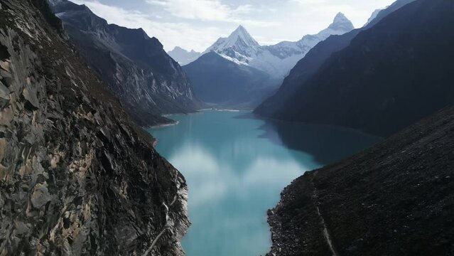 Natural Lake, Laguna Paron Peru Andean Cordillera Aerial Drone Above Clean Water with Mountain Peak Vision, Protected Natural Reservoir