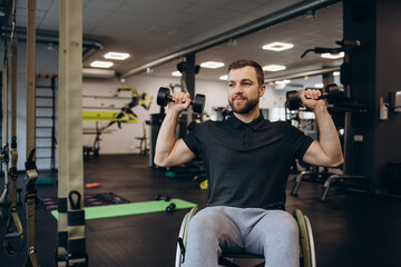 Hardworking invalid exercising with weights in the gym