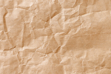 Kraft paper texture. Brown crumpled paper.
