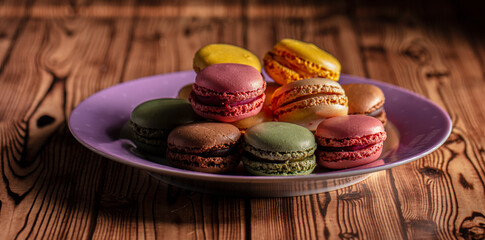 Close-up of macarons cakes of different colors .Culinary and cooking concept. Tasty colorful macaroons.