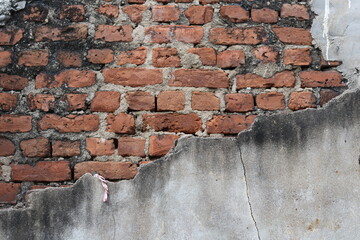 Broken brick wall with rustic texture