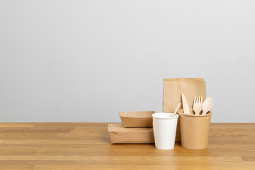 Eco friendly food packaging. Paper recycling zero waste natural products. A box of paper for food disposable catering of nature and recycling concept. Plastic free set on background.