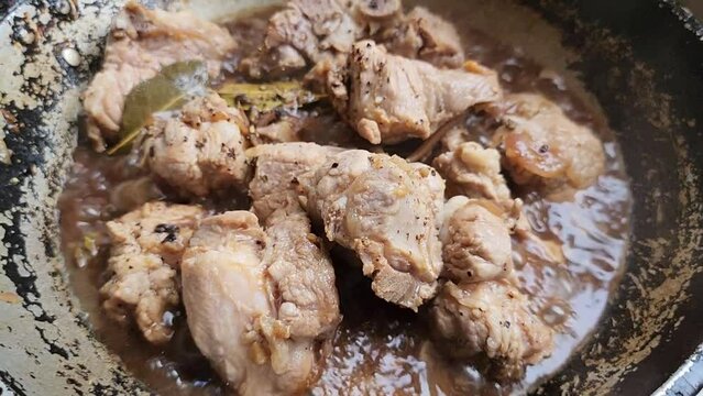 Traditional Filipino Foods - Cooking Pork Adobo and Adding Ingredients 