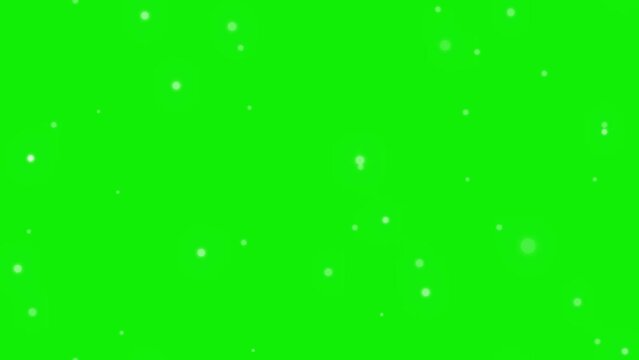 4K seamless animation of falling snow with fading animation (green background for chroma key use)..