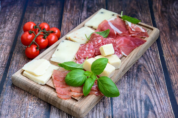 Slices Of  Traditional Italian antipasti mortadella Bolognese,salame Milano, parmesan cheese  and...