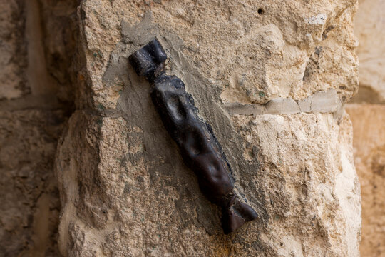 Ancient Mezuza close up on Zion gate. Jerusalem.Israel.
