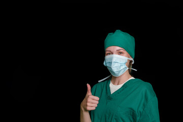 Fototapeta na wymiar Doctor surgeon preparing makes an operation. Isolated on a black background.
