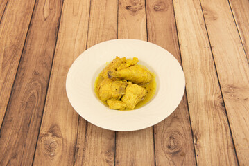 Chicken curry is a common recipe in Asian cuisines. It usually consists of chicken in an onion and tomato-based sauce, seasoned with ginger, garlic, chilli