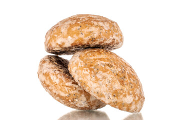 Three sweet tasty gingerbread cookies, macro, isolated on white background.
