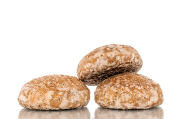 Three sweet tasty gingerbread cookies, macro, isolated on white background.
