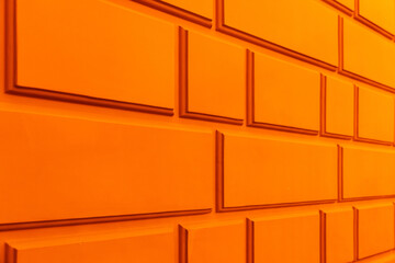 Orange wall with classic rustication pattern,