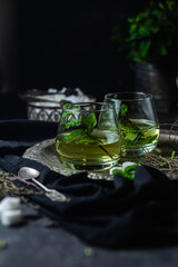 herbal, mint tea on a dark background