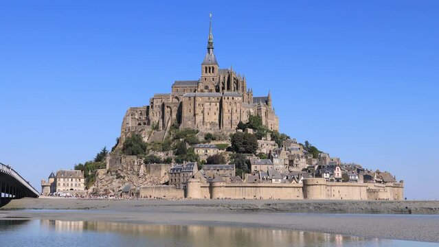 View of Mont Saint Michel, beautiful historic abbey in Normandy situated on iconic tidal island, France.