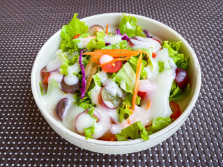 A closeup shot of a delicious vegetable salad on the table