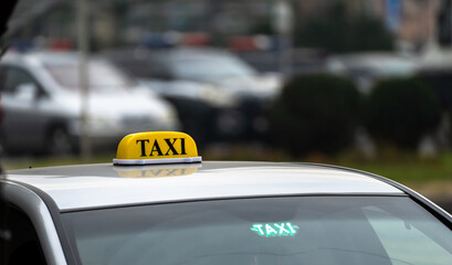 Car with taxi sign