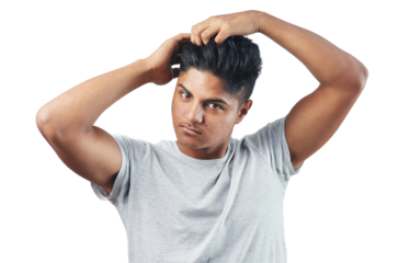 Studio shot of a young man putting his fingers through his hair against isolated on a transparent png background