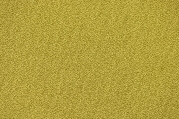 Yellow single color rough fabric background.