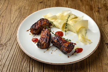 delicious fried ribs in sauce
