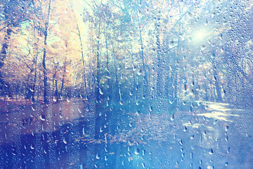 autumn view window raindrops on glass, abstract sad landscape wallpaper