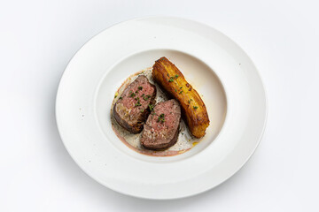 delicious fried steak in sauce in a restaurant
