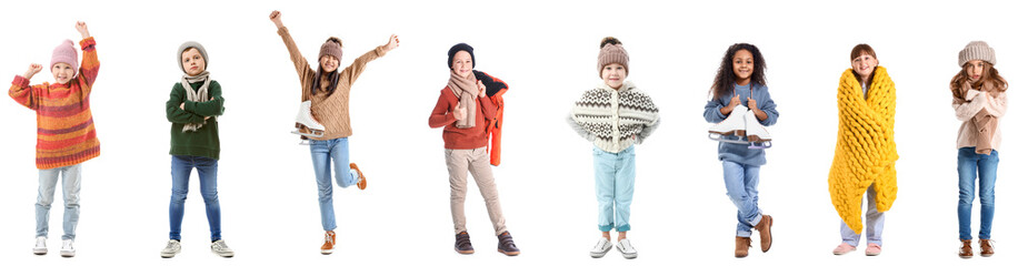 Group of adorable little children in winter clothes on white background