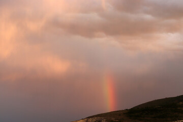 Naklejka na ściany i meble Rainbow. Dramatic sky towards sunset. Sky background.