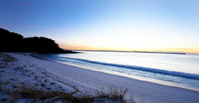 Idyllic sandy beach at sunrise
