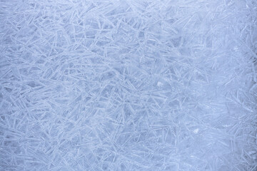 Fototapeta na wymiar winter frostwork background, Frosty pattern at a winter window