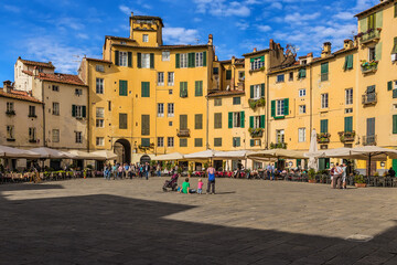 Lucca, Italy. Medieval buildings in Piazza dell'Anfiteatro built on the basis of an ancient amphitheater