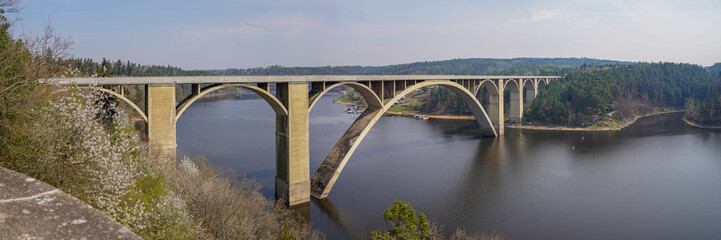Fototapeta premium Žďakovský bridge over the embankment of the Vltava river in the Czech Republic