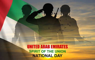 Silhouette of a soldiers on background of the sunrise and UAE flag