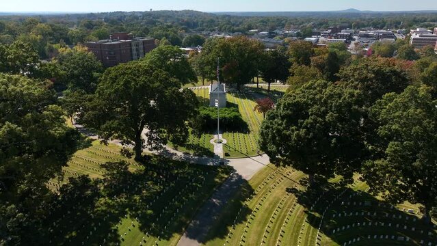 Aerial pullback reveals National Cemetery of US military veterans.