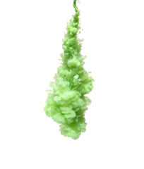 Abstract splash of green paint on white background