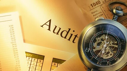 Pocket watch on financial papers as background