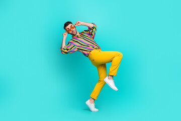 Side profile full length size photo of funky pouted lips guy wear vintage shirt walk tiptoe quiet...