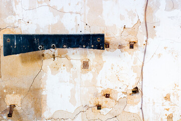 Cracked plaster wall inside a ruined miner's house, Mazarron, Spain