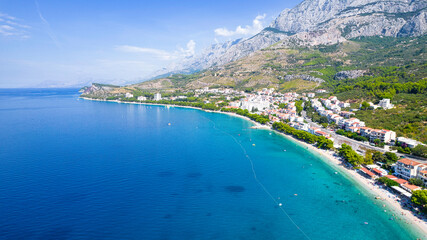 Fototapeta premium Aerial view of Brela and Punta Rata beach on Makarska riviera, Dalmatia region of Croatia