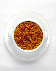 Baked rice with octopus and homemade tomato sauce