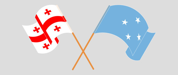 Crossed and waving flags of Georgia and Micronesia