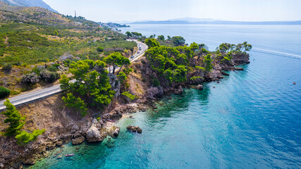 Rocky coast on the sea coast on a summer sunny day, Riviera Makarska, Croatia
