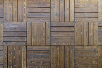 Wooden planks background wall. Textured rustic wood old paneling for walls, interiors and construction.