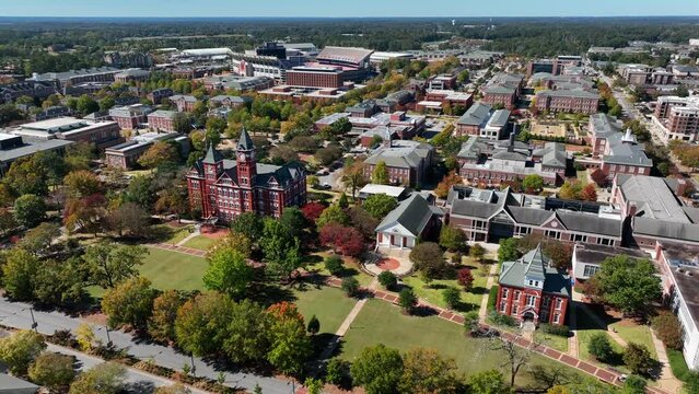 Aerial footage of college campus in the American South. University with brick buildings theme.