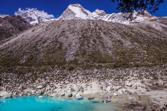 Turquoise Paron lake in Cordillera Blanca, snowcapped Andes, Ancash, Peru