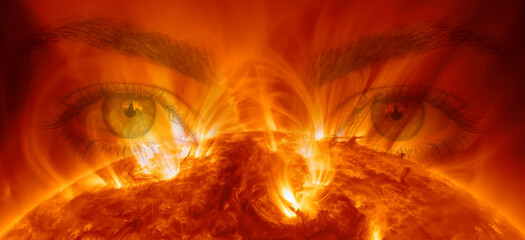 A beautiful pair of eyes looking out from behind the sun 
