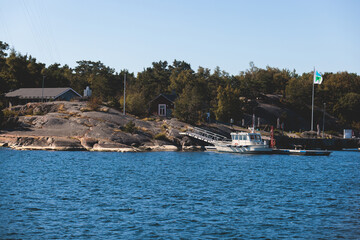 Archipelago National Park landscape, Southwest Finland, with islands, islets and skerries, Saaristomeren kansallispuisto, summer sunny day, view from shuttle ship ferry boat in the Archipelago Sea