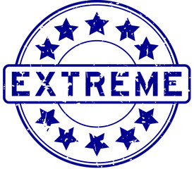Grunge blue extreme word with star icon round rubber seal stamp on white background