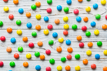 colorful candies as background top view. Seamless pattern with candy. Many sweet candies close-up