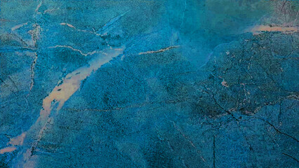 Dark blue marble or cracked concrete background (as an abstract mystical background or marble or concrete texture)