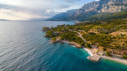 Beautiful coastline on the Riviera Makarska on Adriatic sea in Croatia, tourist resorts and beach, overhead view