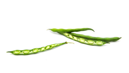 Fresh organic green beans isolated on white background. Beans cut into two halves.